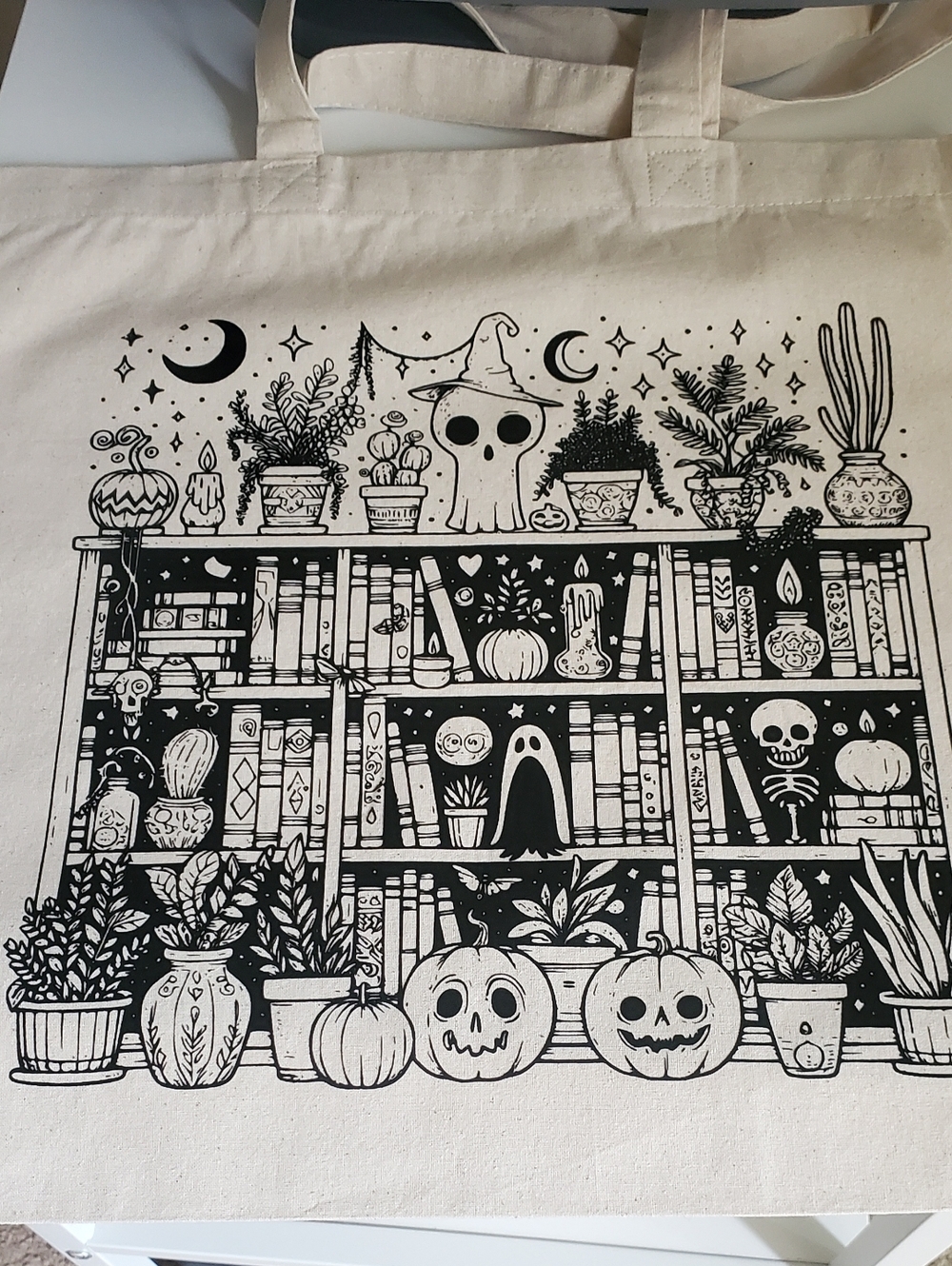 Canvas Tote Bag with Black Halloween Shelf Illustration